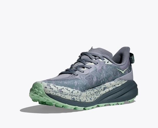 Trail running shoe, Speedgoat 6 in gray and green with breathable mesh and Vibram® Megagrip sole, designed for technical terrain.