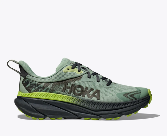 Challenger 7 GTX trail running shoe with GORE-TEX, green mesh, and cushioned sole.