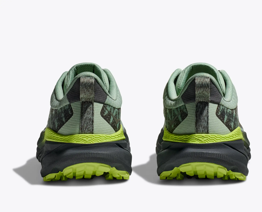 Challenger 7 GTX trail shoes with GORE-TEX and recycled materials, rear view showcasing green and black design.