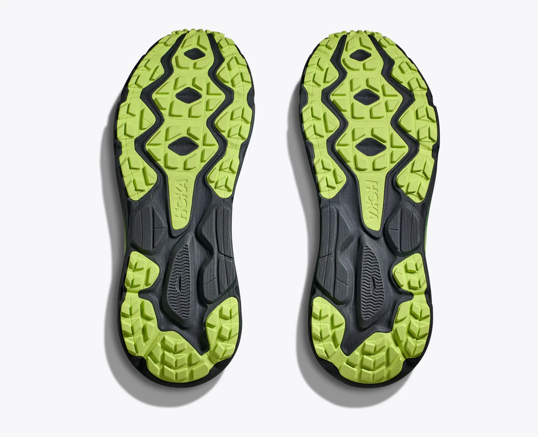 Challenger 7 GTX shoe soles with green and black trail traction pattern.