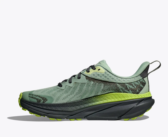 Trail running shoe Challenger 7 GTX with green mesh upper, black sole, and GORE-TEX technology for weather protection.