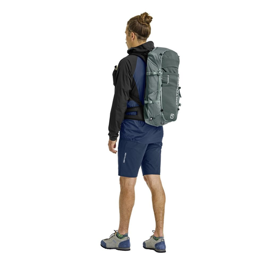 Versatile Traverse 30 backpack designed for alpine adventures, offering comfort, functionality, and eco-friendly materials.