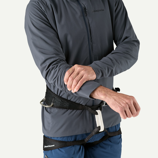 Nano-Air Ultralight Full-Zip Hoody in grey, displayed with a person adjusting sleeves, wearing a climbing harness.
