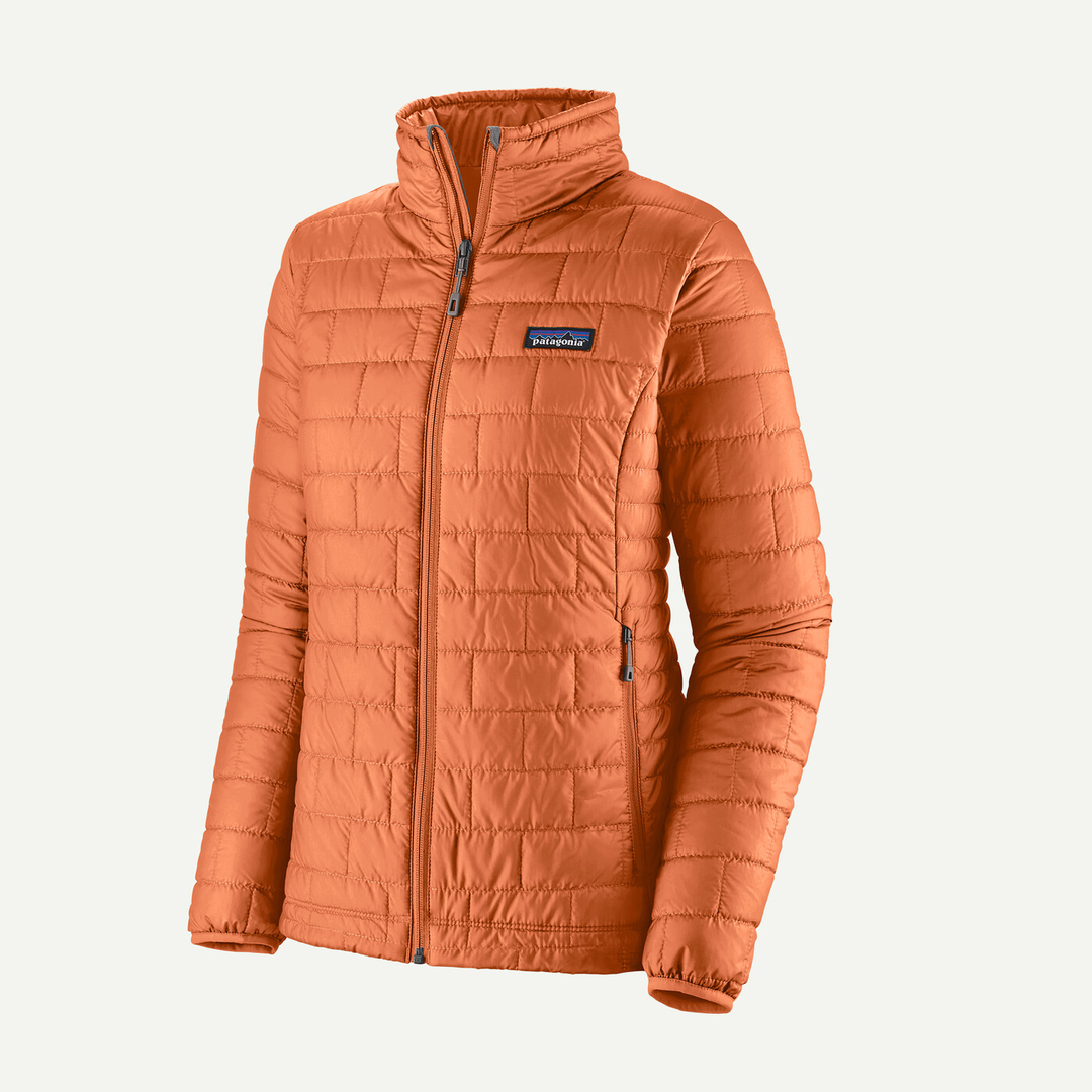 Orange women's Nano Puff Jkt, lightweight, windproof, water-repellent, 100% recycled polyester, PrimaLoft® Gold Insulation, eco-friendly.