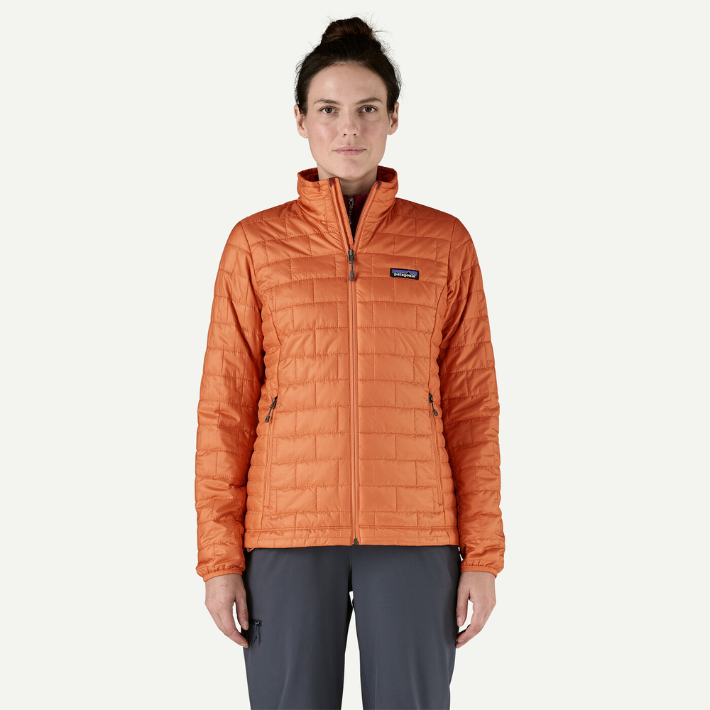 Lightweight orange women's Nano Puff Jkt with eco-friendly PrimaLoft insulation.