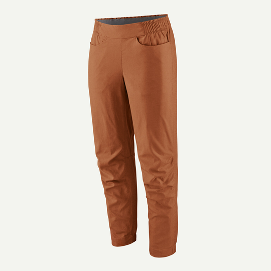 Hampi Rock Pants for women in brown, breathable organic hemp blend, designed for climbing flexibility, featuring elastic waist and tapered leg.