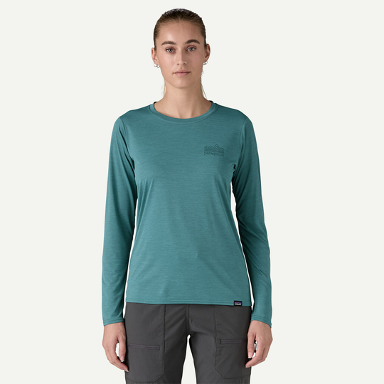 Women's long sleeve Cap Cool Daily Graphic Shirt, versatile technical wear with odor control and recycled polyester.