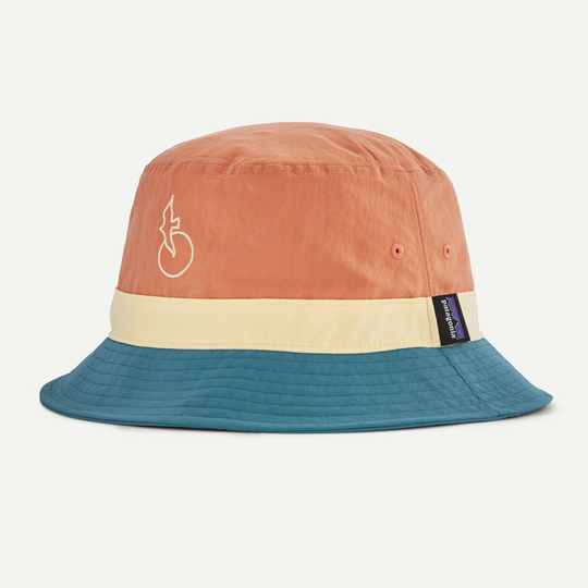Wavefarer Bucket Hat in recycled nylon, orange and blue, with DWR treatment for sun protection.