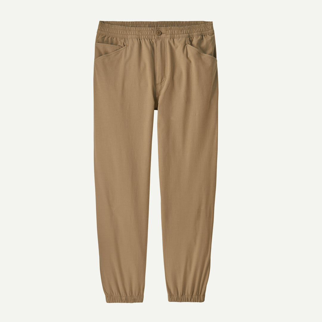 M's Nomader Joggers in khaki color, durable stretch fabric, elastic waistband.