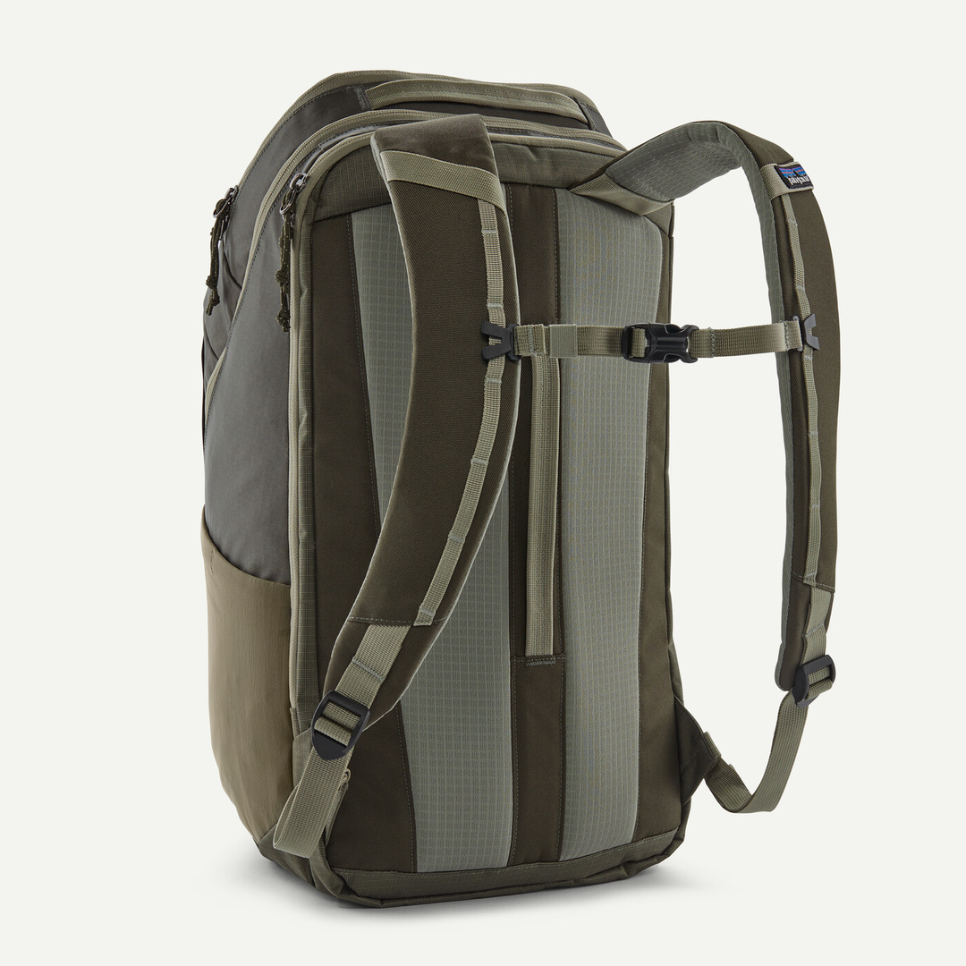 32L Black Hole Pack, durable recycled polyester, water-repellent, laptop compartment, breathable back panel.