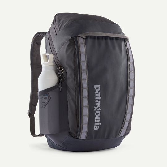 Black Hole Pack 32L, durable recycled polyester backpack with water-repellent finish and multiple compartments.