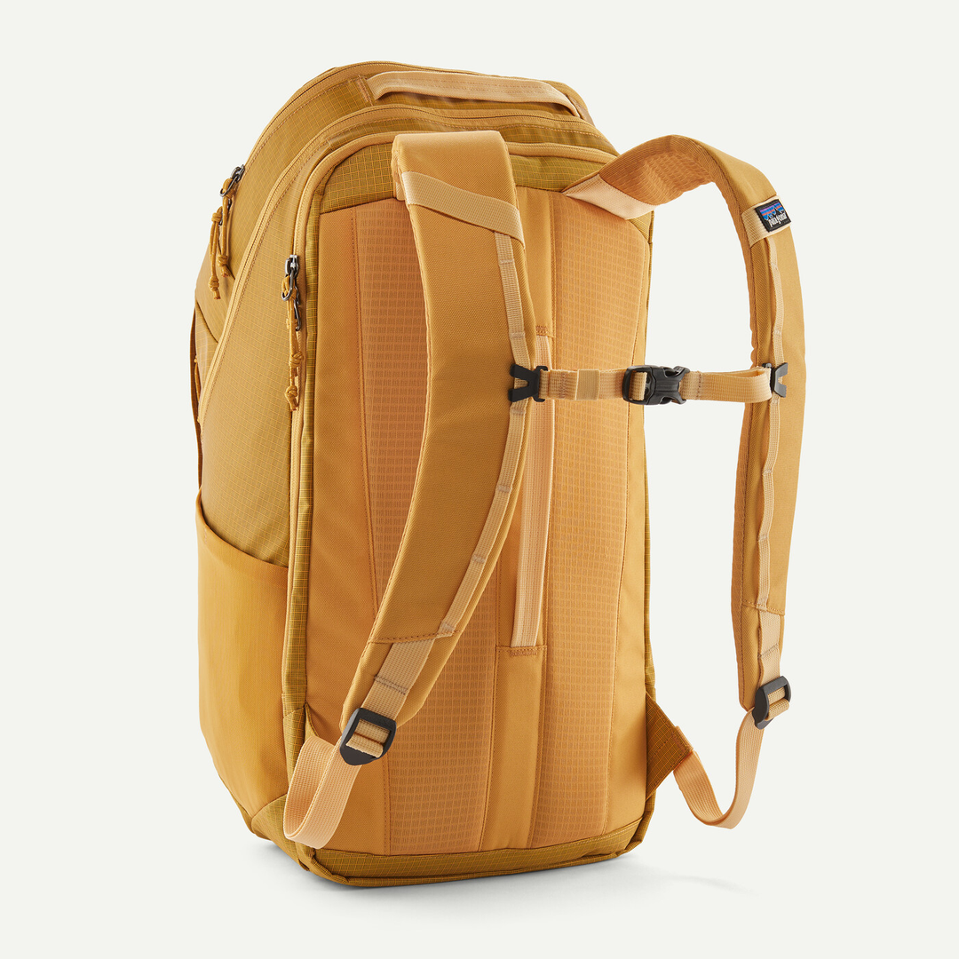 32L Black Hole Pack with durable recycled polyester, laptop compartment, breathable back panel, and water-resistant finish.