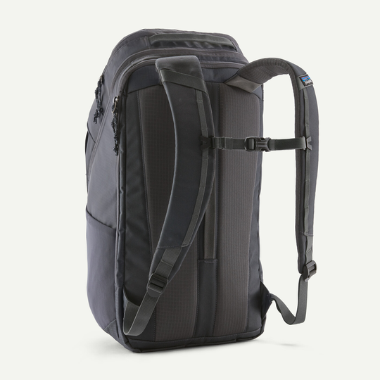 Black Hole Pack 32L backpack in black, featuring padded straps and breathable back panel.