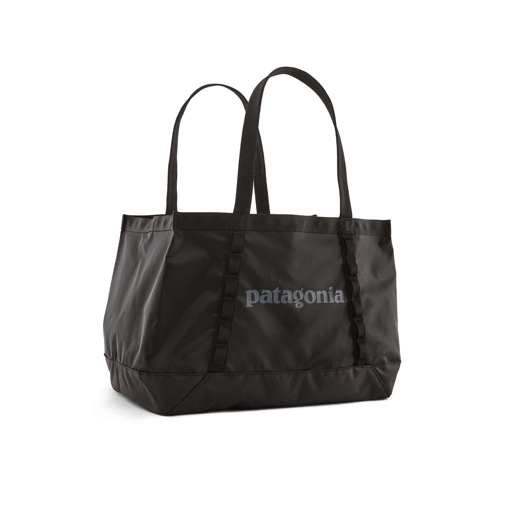 Black Hole Tote 25L, lightweight and durable recycled polyester bag, Patagonia logo.