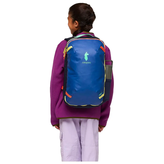 Allpa Mini 20L Travel Pack on person, featuring durable, waterproof design and adjustable straps.