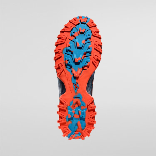 Bushido III shoe sole with aggressive tread and FriXion® Red bi-compound design.