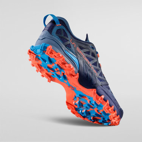 Bushido III trail running shoe with aggressive grip and breathable mesh, shown on a gray background.