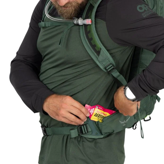 Raptor 10 hydration backpack with waist pocket access for snacks and essentials.