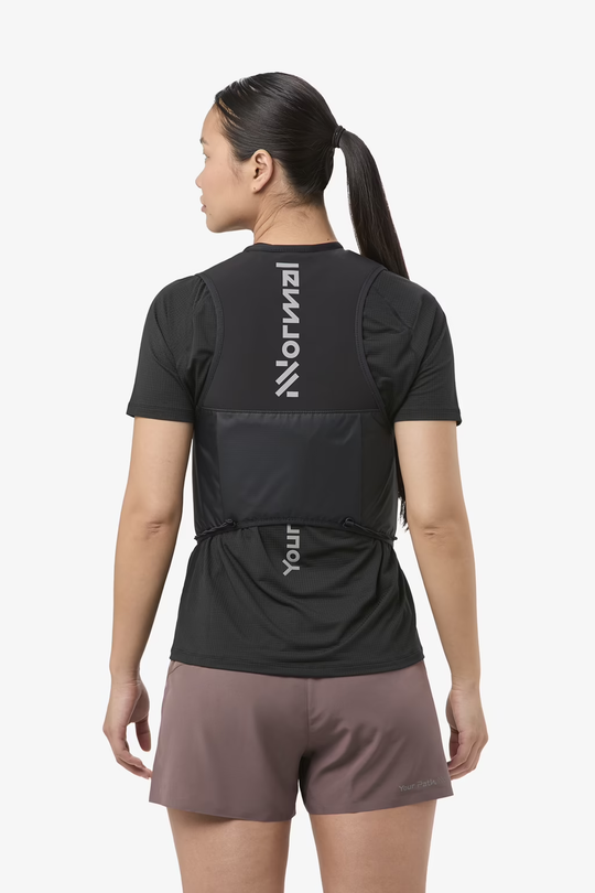 Trail running vest by NNormal with advanced closure, breathable mesh back, and durable elastic flask pockets.