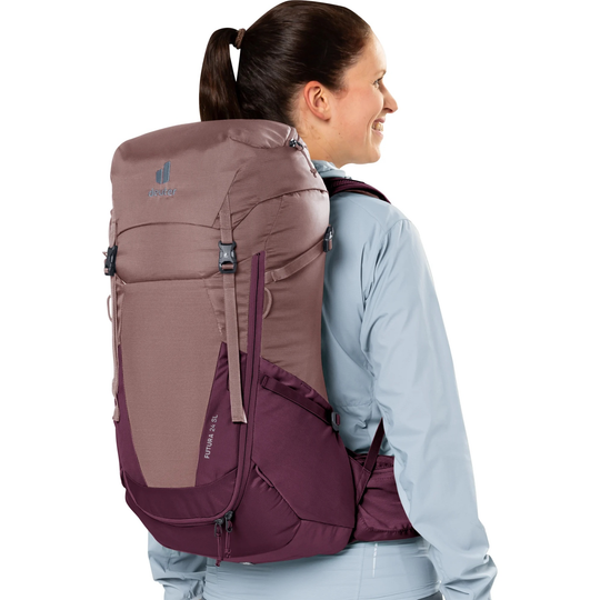 Backpack 'Futura 24 SL' designed for women, featuring Aircomfort back system, adjustable straps, and rain cover.
