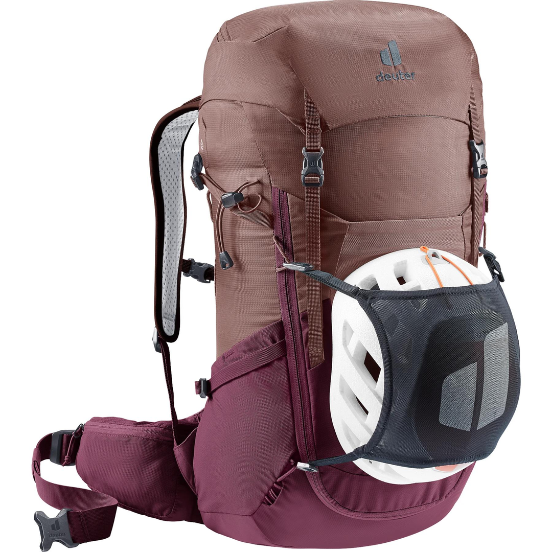 Backpack "Futura 24 SL" designed for women's comfort with adjustable straps, Aircomfort ventilation, 24-liter capacity, helmet attachment, and rain cover.