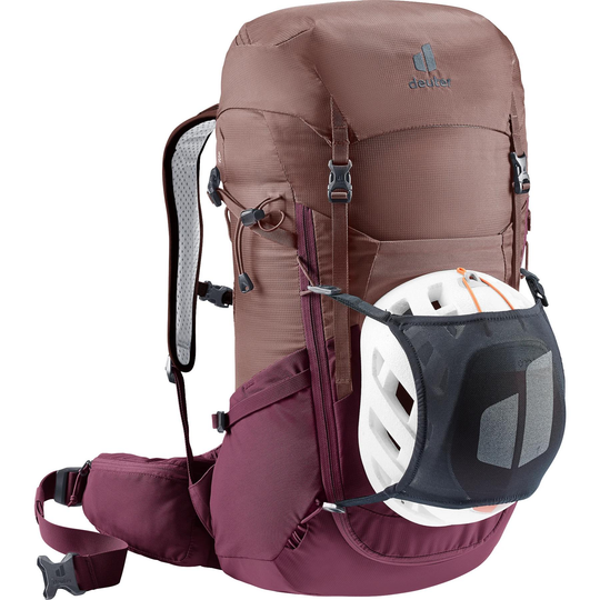 Backpack "Futura 24 SL" designed for women's comfort with adjustable straps, Aircomfort ventilation, 24-liter capacity, helmet attachment, and rain cover.