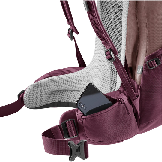 Futura 24 SL backpack with ergonomic design and phone stored in side pocket.