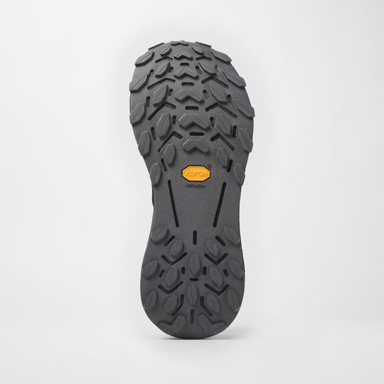 Cadí M trail running shoe with engineered mesh upper, soft cushioning, and Vibram Megagrip outsole for smooth and rolling terrain