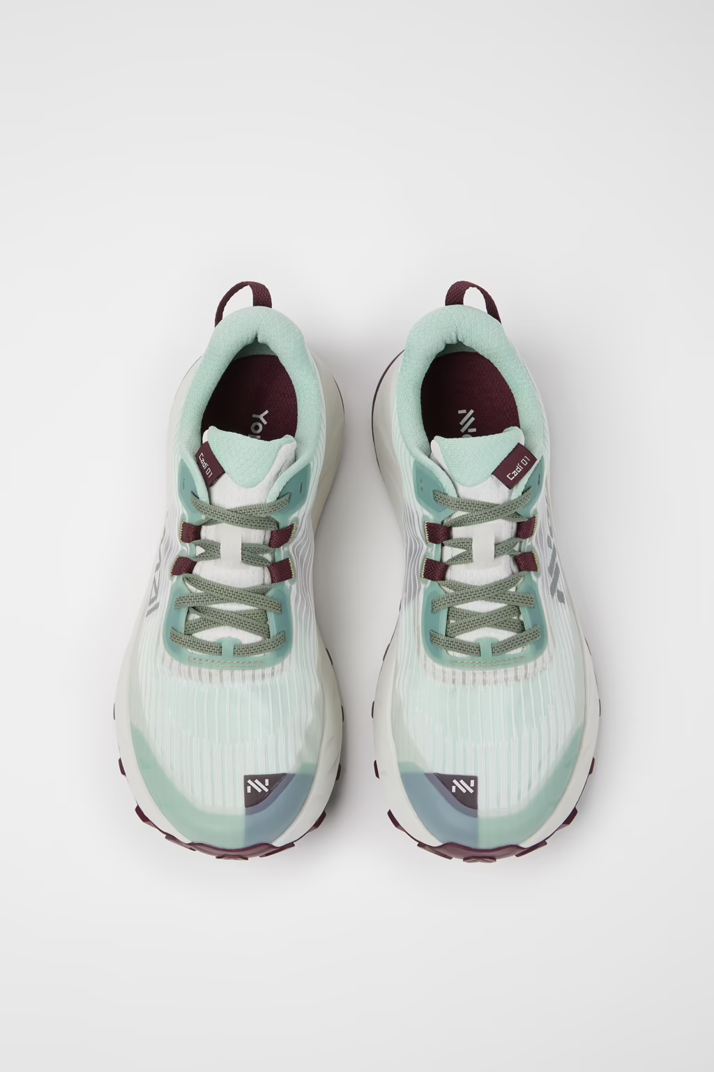 Cadí M trail running shoe with engineered mesh, Vibram Megagrip sole, and soft cushioning for mountain comfort