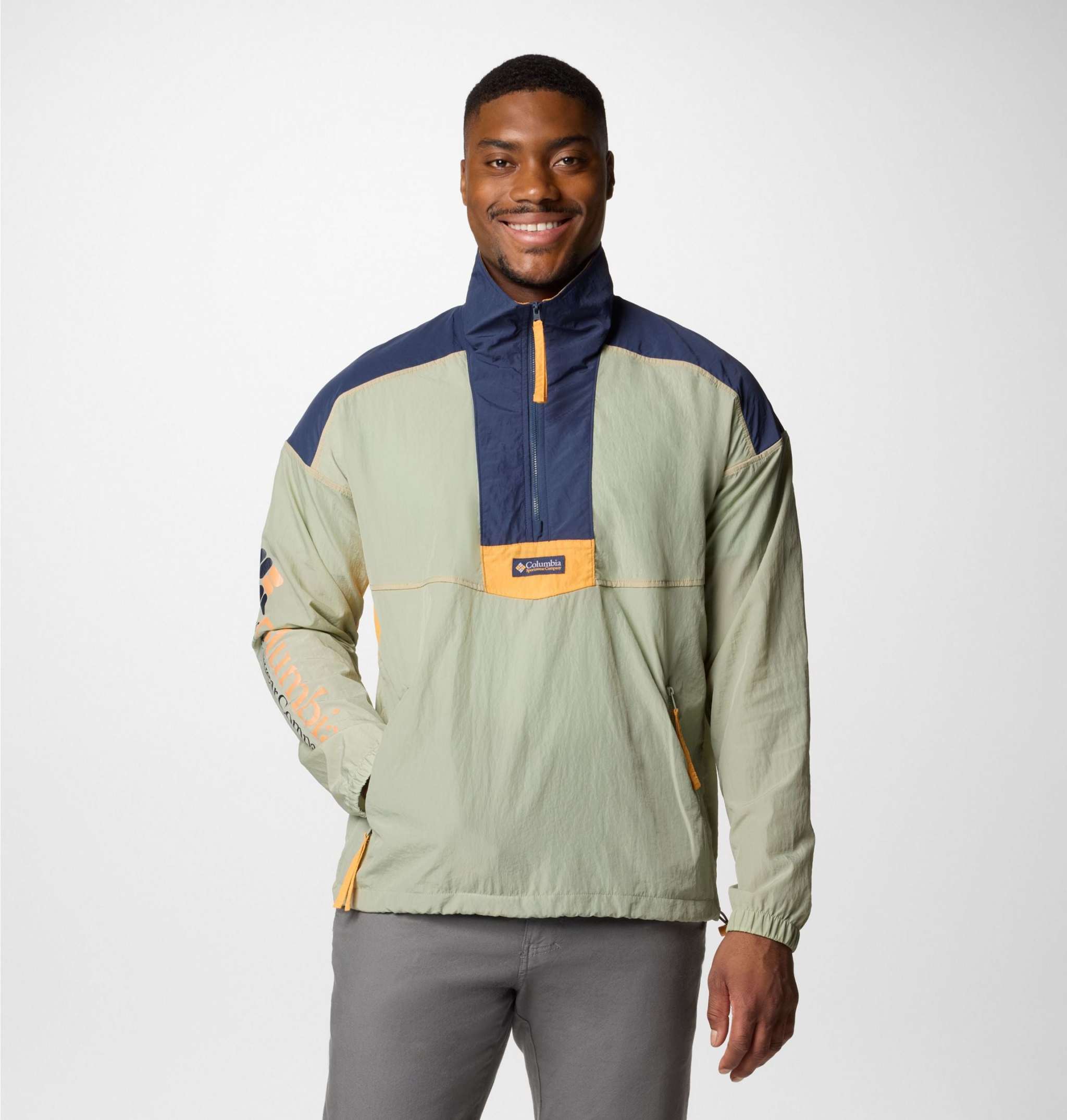 Men's retro style windbreaker jacket with water and wind resistance, zippered pockets, and foldable design