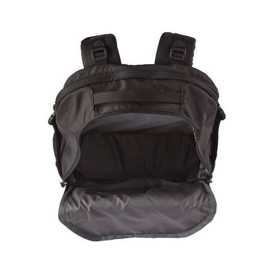 Refugio Day Pack 30L open view showing spacious interior and adjustable straps.