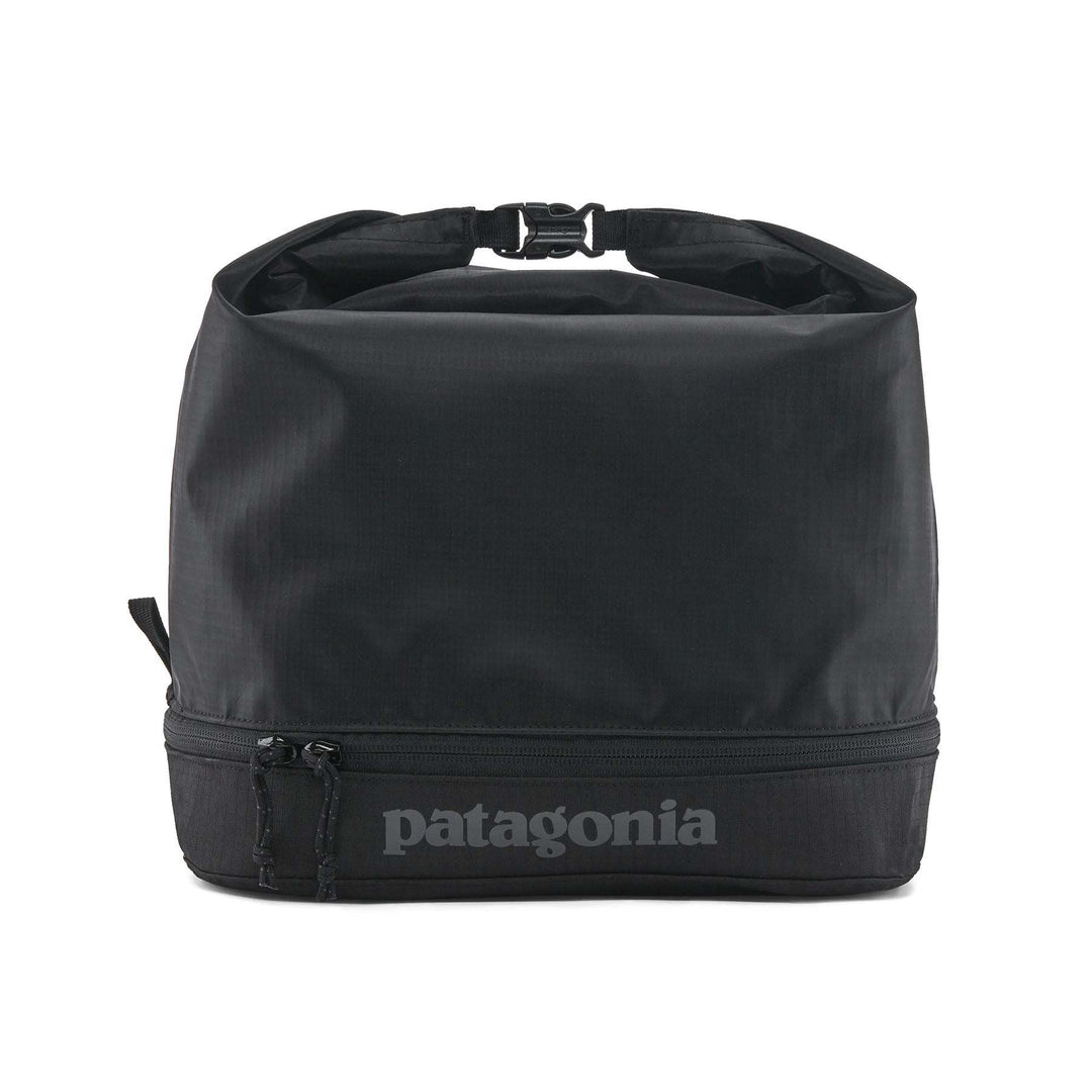 Black Hole MLC Cube in black with roll-top design and zippered compartment, 12L capacity.