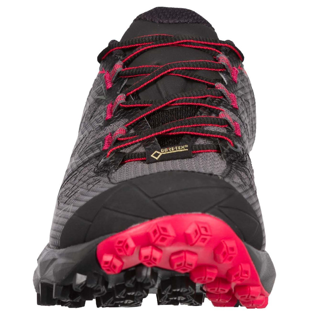 Waterproof Akyra Woman Gtx trail running shoe with GORE-TEX, red and black design, ideal for winter running.