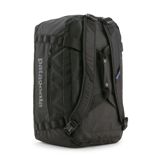 Black Hole Duffel 40L in black, durable and water-repellent, with ergonomic removable straps and carry-on size compliance.