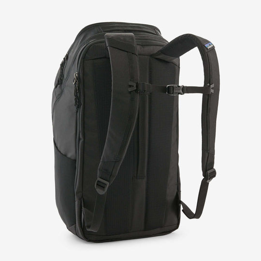 Black Hole Pack 32L backpack with recycled water-repellent fabric and multiple compartments.