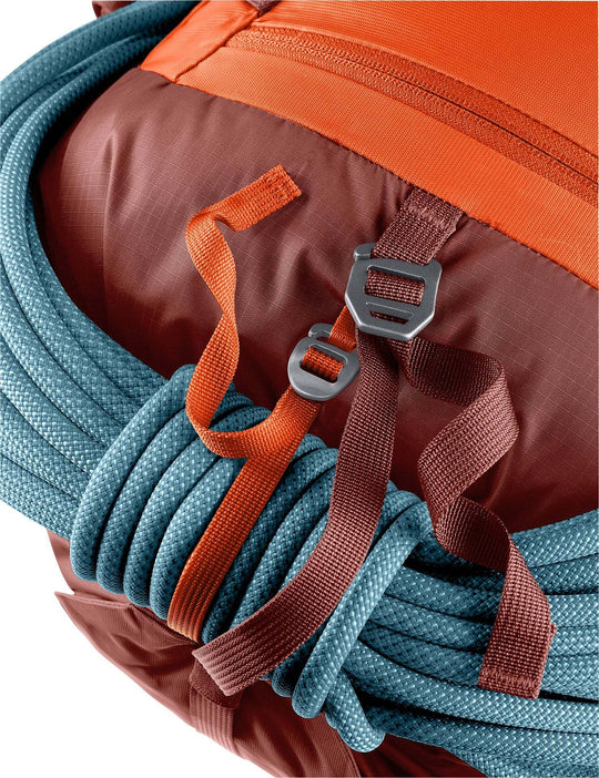 Guide 28 SL backpack strap system with durable material and rope attachment.