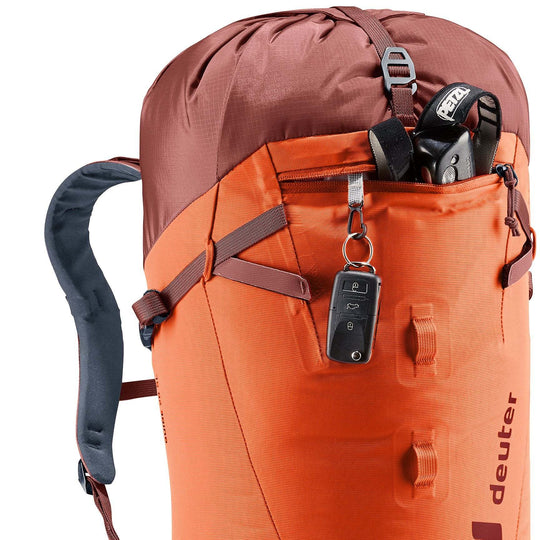 Lightweight Guide 28 SL backpack with durable material, ergonomic straps, adjustable chest belt, and versatile features for climbing gear.