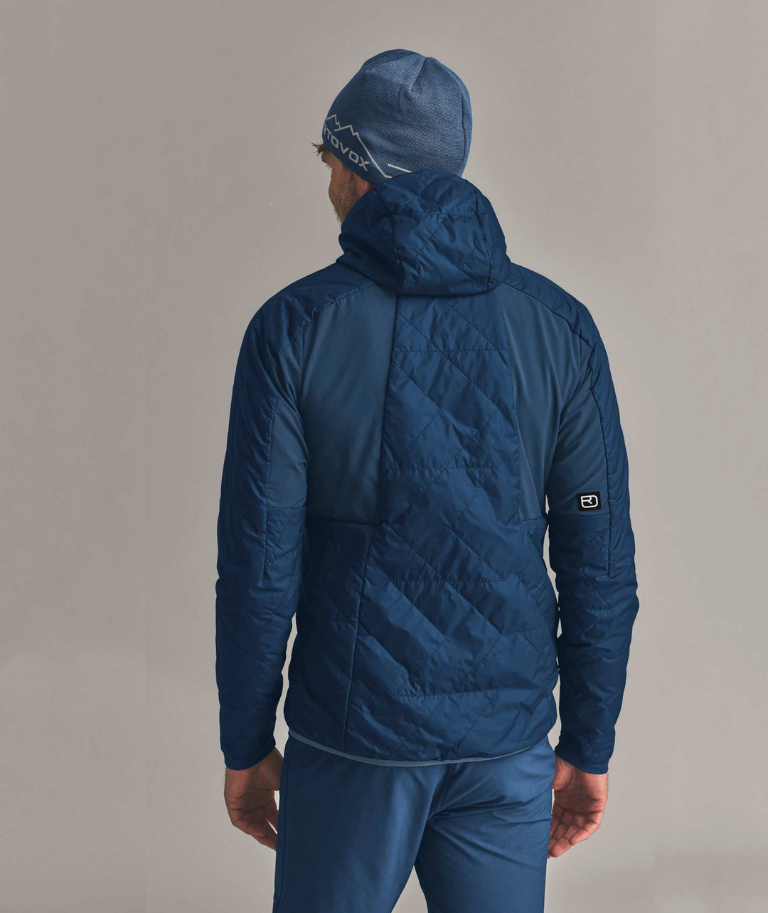 Ortovox Venet Swisswool 60 Jacket M - Blue Nunatak, indossata, vista posteriore