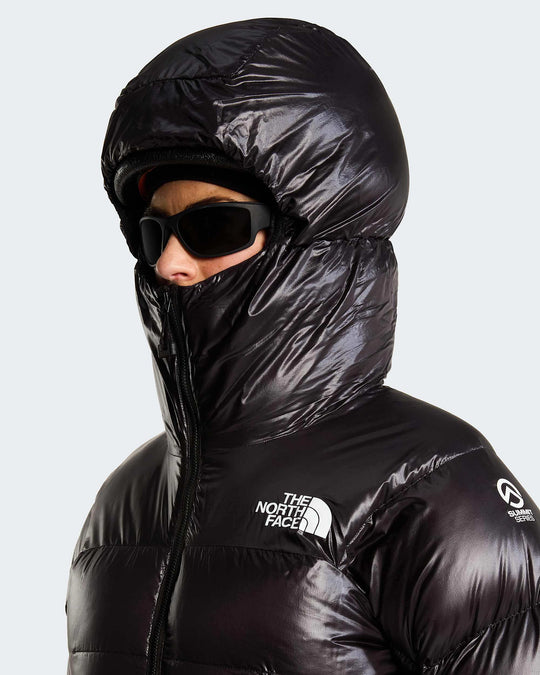 The North Face W Summit Pumori Down Parka - TNF Black - hood-up close-up on model