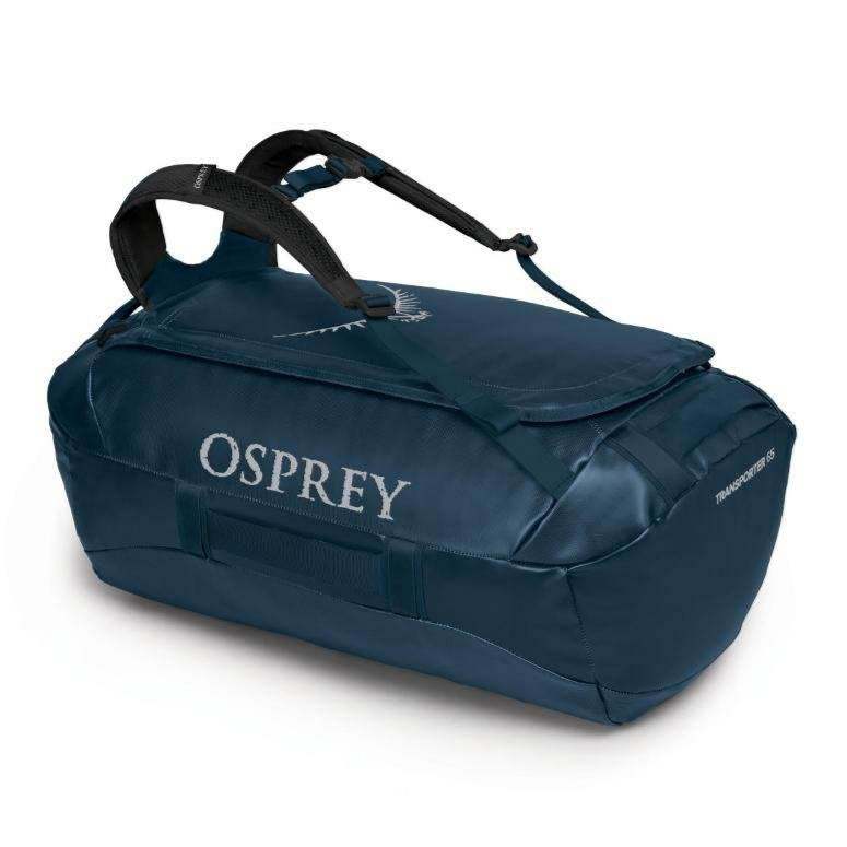 Weather-resistant Transporter 65 duffel bag in blue with durable handles and reinforced zippers.