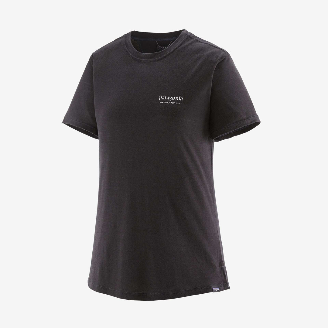 Women's Cap Cool Merino Graphic Shirt in black, featuring breathable merino wool blend for comfort and odor control, with RWS certification and Fair Trade Certified™ production.